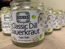 Load image into Gallery viewer, side view of several rows of open jars of classic dill sauerkraut
