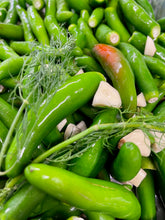 Load image into Gallery viewer, Close up of fresh serrano chilies with chopped garlic and herbs
